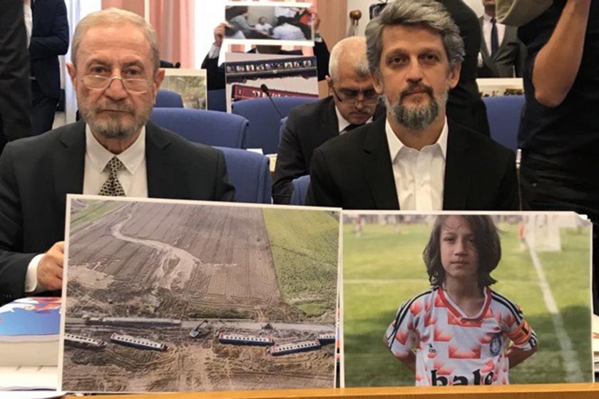 HDP Milletvekili Garo Paylan komisyon toplantısında Oğuz Arda Sel'in fotoğrafının arkasında