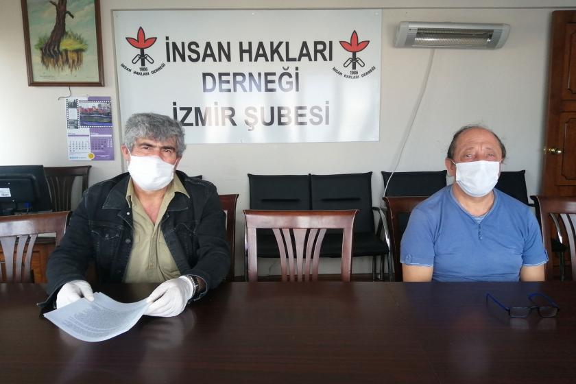 İHD İzmir şube yöneticileri basın açıklaması yaparken