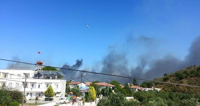 Avşa Adası’nda çöplükte çıkan yangın zeytinliklere sıçradı