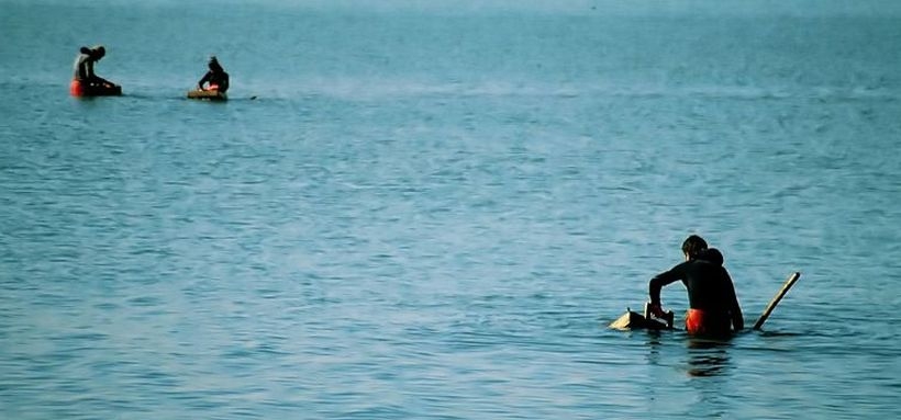 Ekmeklerini  denizden çıkaranlar: Kum midyesi işçileri