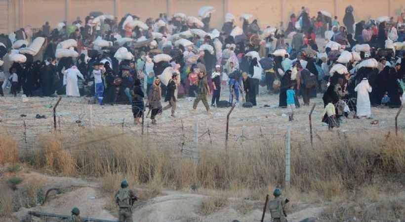 IŞİD militanları Til Ebyad'lıları zorla kente döndürdü